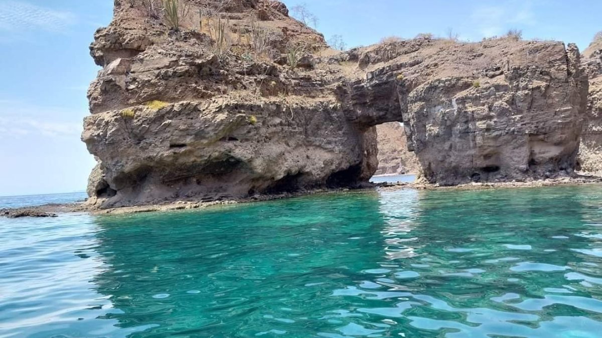 The natural sea arch on Isla Danzante, a snorkeling stop on a private boat charter in Loreto